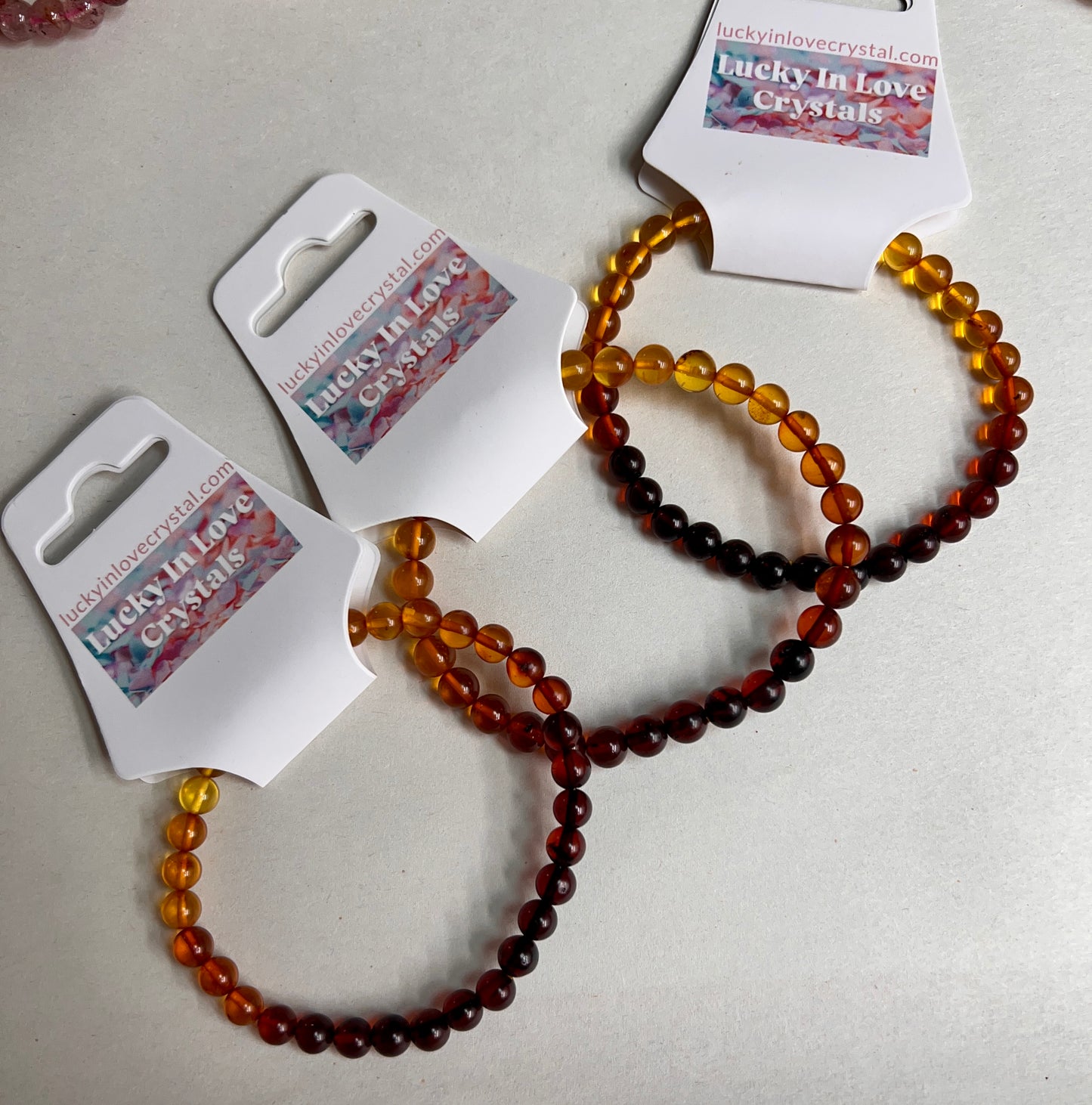 6MM RAINBOW AMBER ALL NATURAL BRACELET